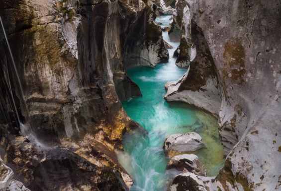 Condor-travel-Europe-river-Soca